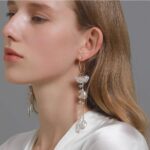 White Floral Chain Tassel Long Earrings - Image 4