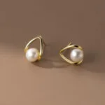 Minimalistic V Pearl Stud Earrings - Image 4