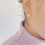 Minimalistic V Pearl Stud Earrings - Image 5
