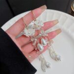 White Floral Chain Tassel Long Earrings - Image 8