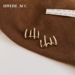 Golden Embrace Crystal Claw Earrings - Image 6