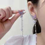 purple butterfly studs