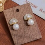 big pearl studs with crystals